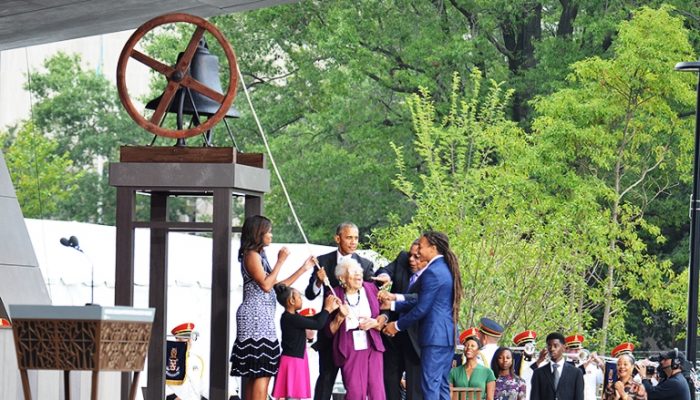 Members of the Bonner family join Firs Lady Michelle Obama (left) and President Barack Obama (3rd from the left) to ring the freedom bell from the First Baptist Church of Williamsburg, which was founded in 1776 and is one of the country's oldest Black churches. (Freddie Allen/AMG/NNPA)