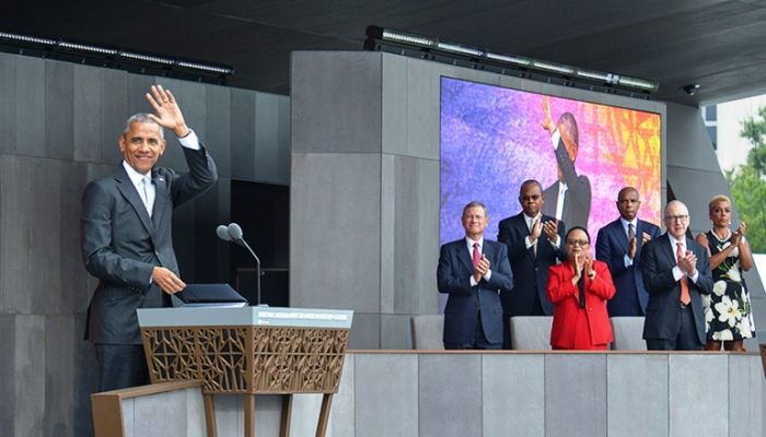 President Barack Obama waves to the crowd during the grand opening ceremony for the National Museum of African American History and Culture on the National Mall in Washington, D.C. (Freddie Allen/AMG/NNPA)