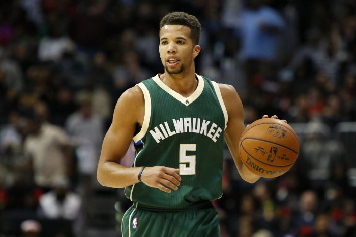 FILE - In this Feb. 20, 2016, file photo, Milwaukee Bucks guard Michael Carter-Williams (5) dribbles against the Atlanta Hawks in the second half of an NBA basketball game, in Atlanta. Point guard Michael Carter-Williams will have left hip surgery and miss the rest of the season for the Milwaukee Bucks. General manager John Hammond said Monday, March 7, 2016,  that Carter-Williams would have the procedure in Colorado on Thursday to repair a torn labrum.  (AP Photo/Brett Davis, File)