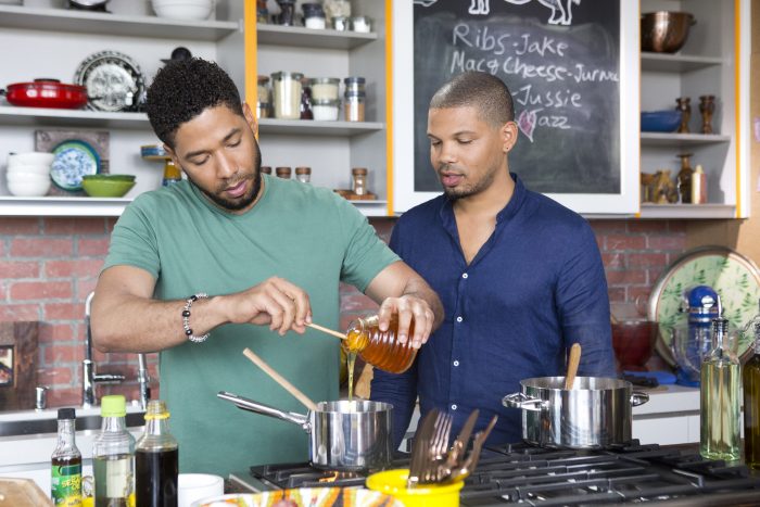 Jake helps Jussie prep his Grilled Chicken Wings with Pineapple-Ginger Teriyaki Sauce, as seen on Cooking Channel's What's Cooking With The Smollets, Season 1.(Courtesy Photo - Food Network) 