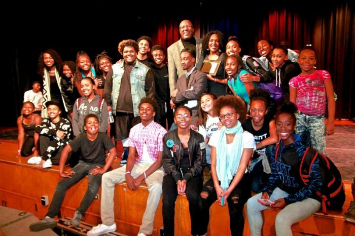  Students gather on stage with Rory Pullens after seeing their peers perform. (Photo by E. Mesiyah McGinnis) 