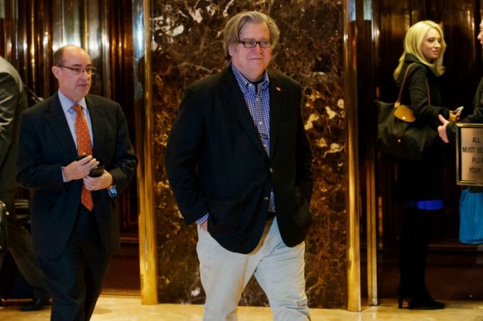 In this Friday, Nov. 11, 2016, file photo, Stephen Bannon, campaign CEO for President-elect Donald Trump, leaves Trump Tower in New York. Trump on Sunday named Republican Party chief Reince Priebus as White House chief of staff and conservative media owner Bannon as his top presidential strategist, two men who represent opposite ends of the unsettled GOP. (AP Photo/Evan Vucci, File)