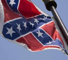 Police officer suspended after driving with Confederate flag 