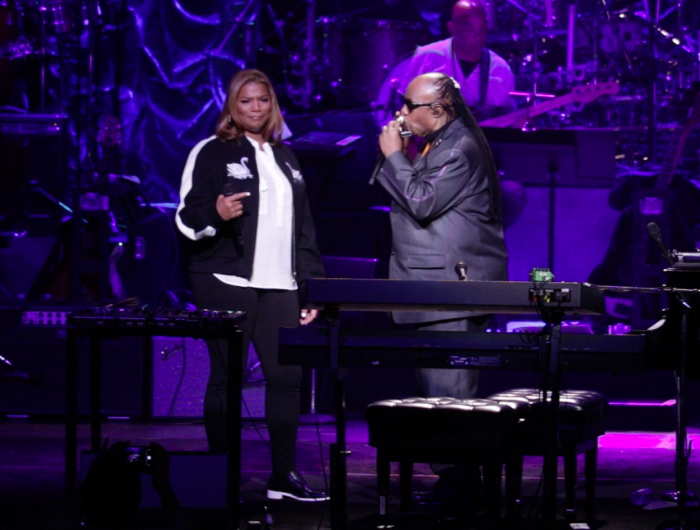 Queen Latifah & Stevie Wonder perform “Georgia Rose” at Stevie's 20th Annual House Full of Toys Benefit Concert at Microsoft Theater on Dec. 9, 2016 in Los Angeles. (Brittany K. Jackson photo) 