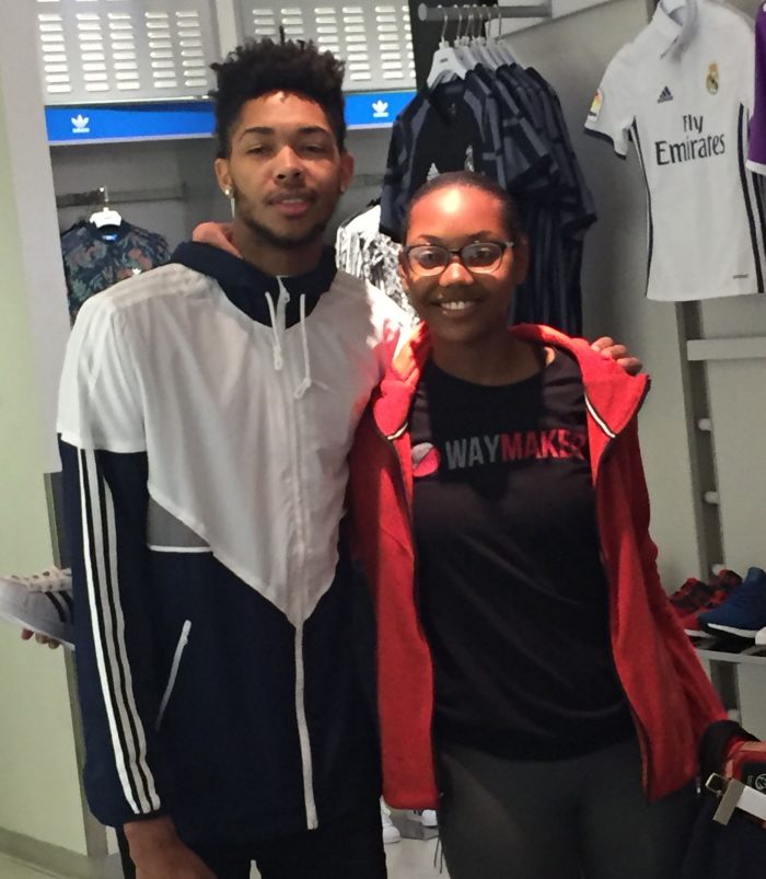 Ingram poses with shopping spree participant. (Courtesy of Excel Sports Management)