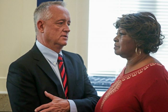 In this Nov. 1, 2016, file photo, Hamilton County Prosecutor Joe Deters, left, speaks with Audrey DuBose, right, the mother of Sam DuBose, in a courtroom at the Hamilton County Courthouse in Cincinnati. (Carrie Cochran/The Cincinnati Enquirer via AP, Pool, File) 