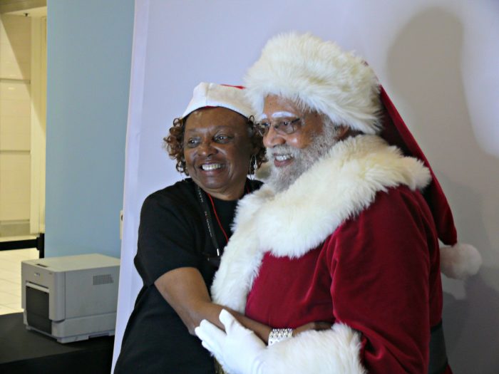  Santa has a true believer in Patricia P. (Photo by Brian W. Carter)  