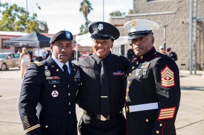 Left to Right: TA'Ana Mitchell's brother William Brown, MGST USMC, her mother Andriea Cavil and her brother Andre Brown LtCol Army. 