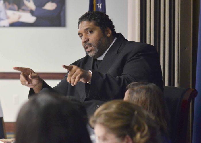  Rev. Dr. William J. Barber II says that GOP legislators have not only conspired to suppress the will of the voters, but also to seize power from a newly-elected Democratic governor in a special Christmas session. This photo was taken during an Advancement Project panel discussion on racial justice at the National Press Club in April 2014. (Freddie Allen/AMG/NNPA)