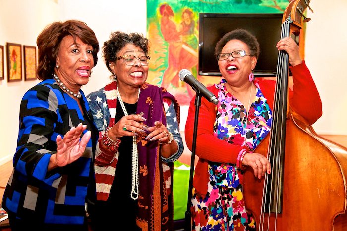 1-Congresswoman Maxine Waters (left) sings with Watts Tower Arts Center Director, Rosie Lee Hooks (center), and Artist-in residence, Bassist, Nedra Wheeler (right) while visiting the center as part of the Black Women's Forum's, Black History Month Museum / Art Gallery Tour, Saturday, February 19, 2017. Participants visited five museums, with the theme chanted and sang, "Get on the bus!" (Photo by E. Mesiyah McGinnis) 