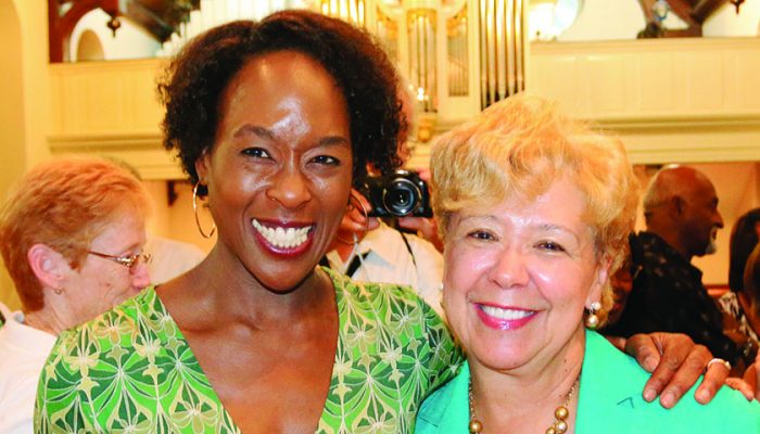 “Hidden Figures” author Margot Lee Shetterly (left) poses for a photo with New Journal and Guide publisher Brenda Andrews. (Ernest Lowery/New Journal and Guide)