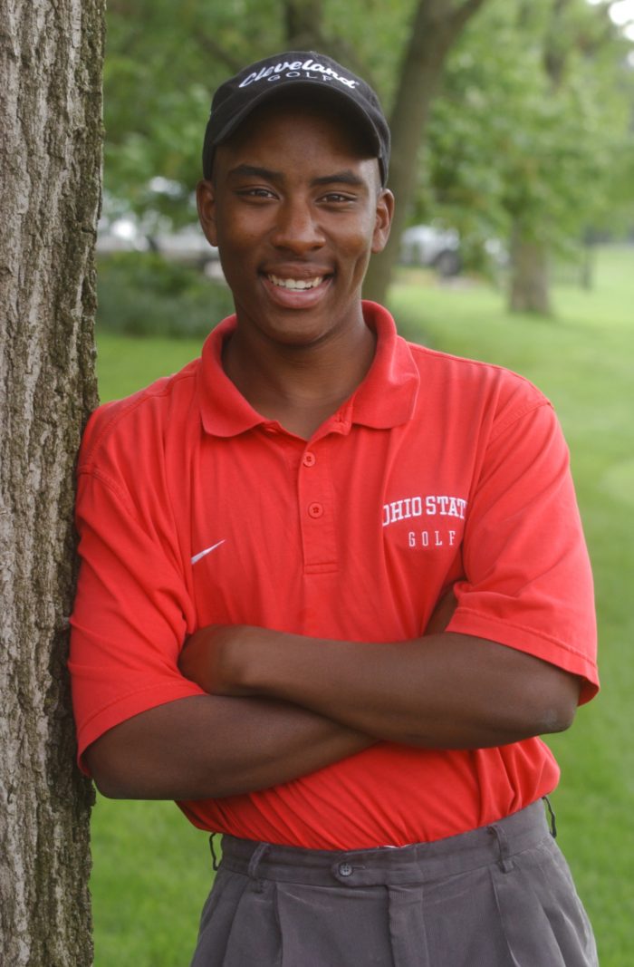 Ohio State golfer Kevin Hall pose for a photo at the school's golf course in Columbus, Ohio, Tuesday, May 18, 2004. Hall, who  has been deaf since a bout with meningitis when he was 2, won medalist honors at the Big Ten tournament two weeks ago by 11 strokes, prompting his fellow competitors to give him a standing ovation at the awards ceremony after the three-day tournament. (AP Photo/Paul Vernon)