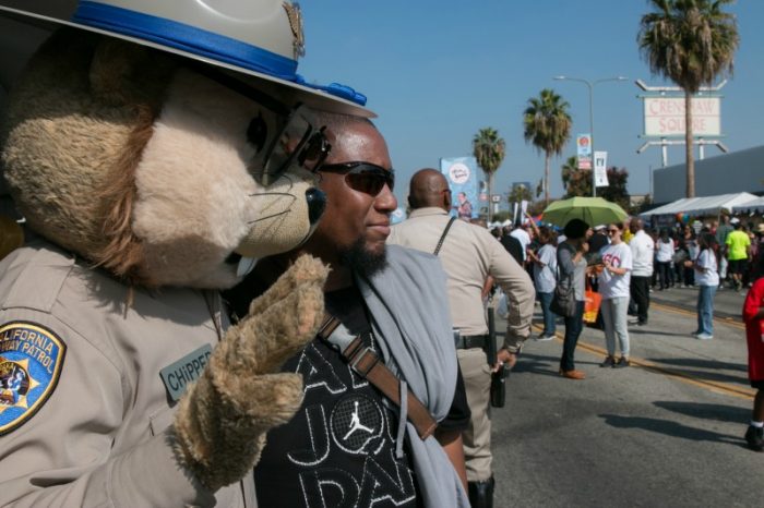 Chipper taking a photo with a Taste of Soul patron. (courtesy photo) 