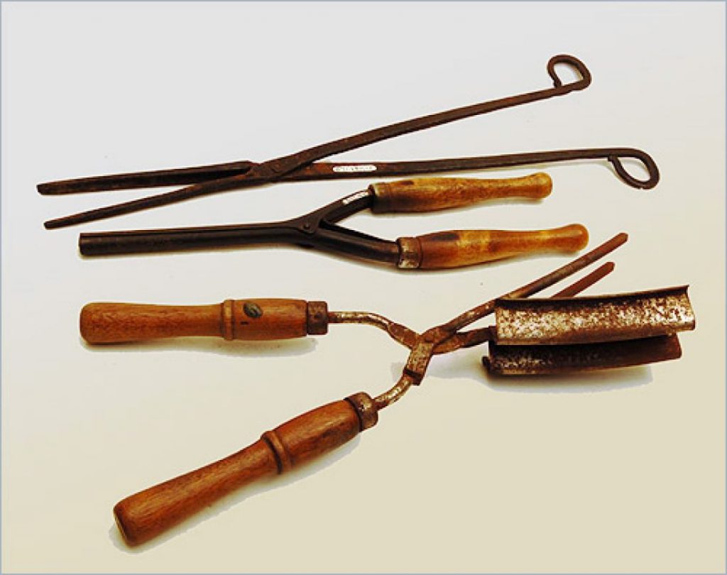 the first curling iron