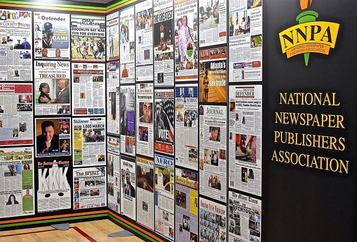 A display wall showcases the front pages of the nation’s Black newspapers. (Travis Riddick/NNPA)