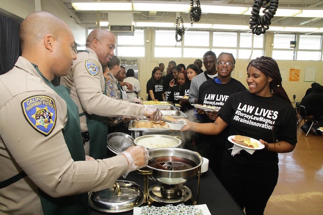 California Highway Patrol flips pancakes and scrambles eggs for Dorsey High School Law Magnet Students