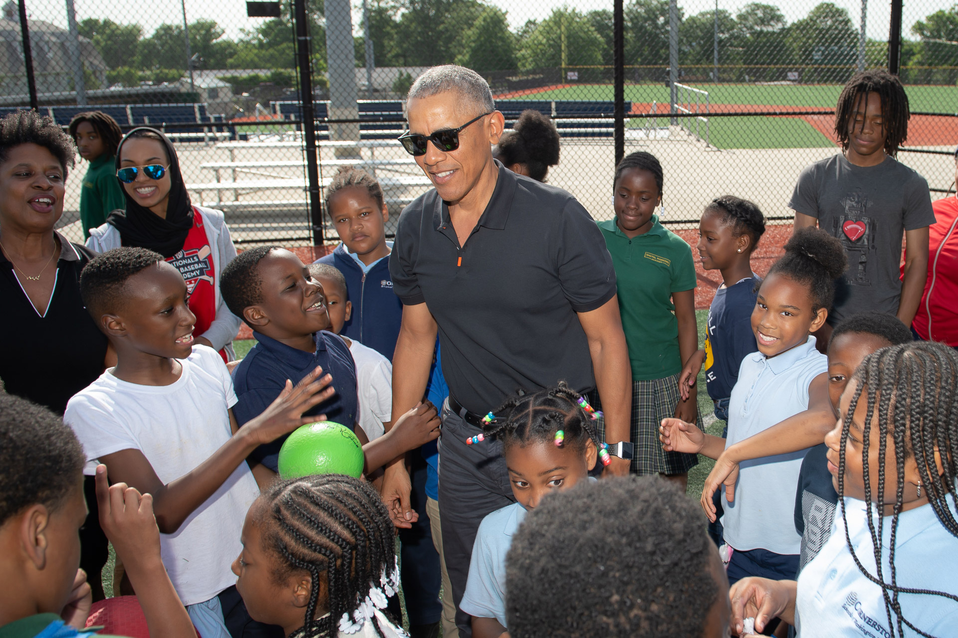 WATCH: President Barack Obama Surprises Students for Football and Baseball Game