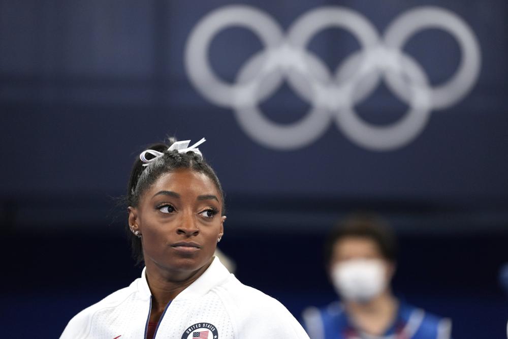 Olympic champ Biles withdraws from all-around competition