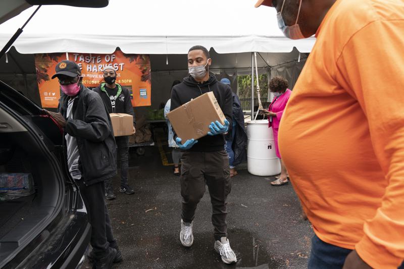 Fewer in US turn to food banks, but millions still in need