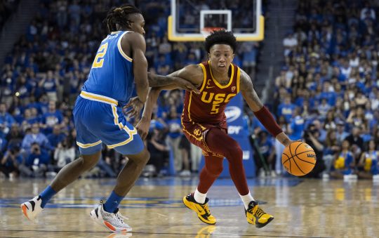 Boogie Ellis scores 24 points to lead USC over UCLA 62-56 and split the LA rivalry