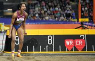 Olympic long jumper Davis-Woodhall sees new commitment lead to new color of medals — gold